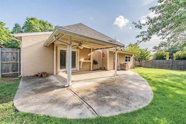 5105 French Wood Dr, Arlington, TX 76016 - back of property featuring a ceiling fan, a fenced backyard, a patio area, roof with shingles, and brick siding