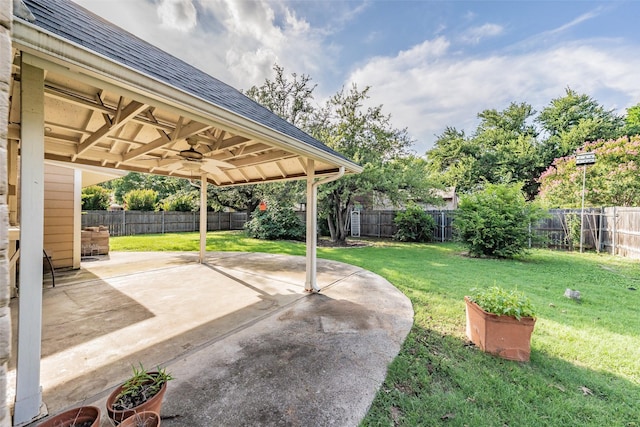 5105 French Wood Dr, Arlington, TX 76016 - fenced backyard with a ceiling fan and a patio