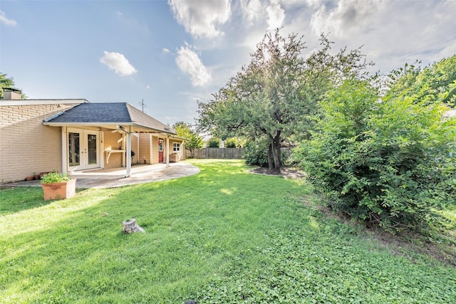 5105 French Wood Dr, Arlington, TX 76016 - view of yard with french doors and a patio area