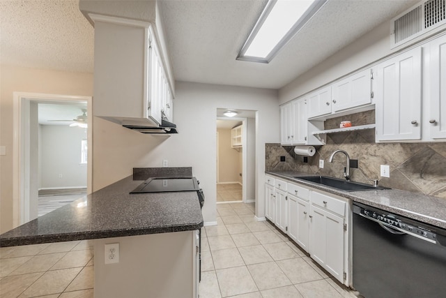 5105 French Wood Dr, Arlington, TX 76016 - kitchen featuring dishwasher, white cabinetry, decorative backsplash, light tile patterned floors, and dark countertops
