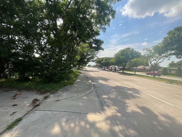 1814 E Belt Line Rd, Carrollton, TX 75006 - view of concrete street with sidewalks and curbs