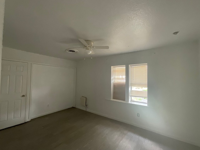 1814 E Belt Line Rd, Carrollton, TX 75006 - spare room featuring wood finished floors and a ceiling fan