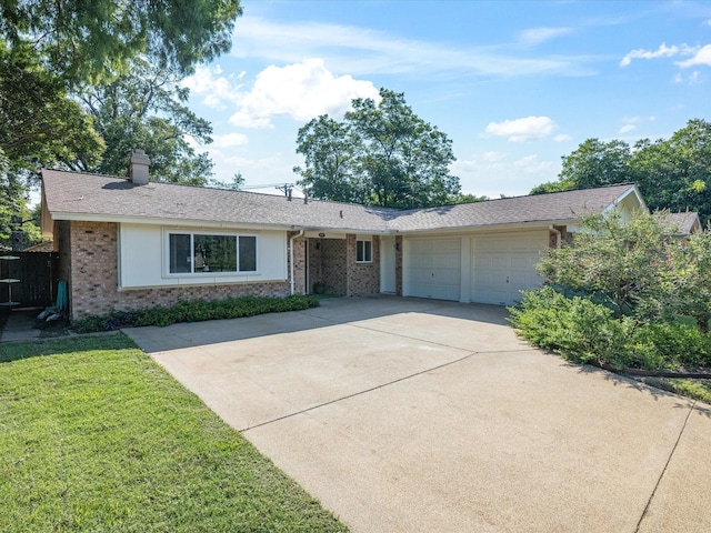 3207 Lynnwood Dr, Arlington, TX 76013 - single story home with brick siding, an attached garage, concrete driveway, a front yard, and a chimney