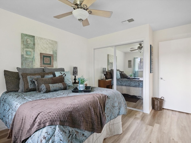 3207 Lynnwood Dr, Arlington, TX 76013 - bedroom with wood finished floors, a closet, and a ceiling fan