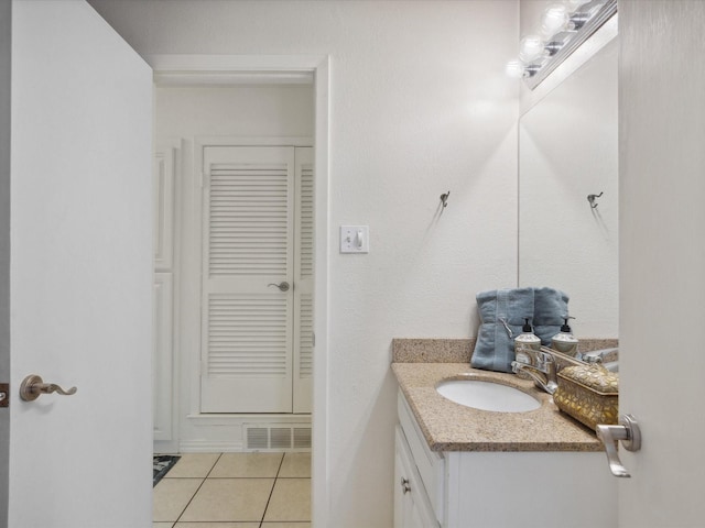 3207 Lynnwood Dr, Arlington, TX 76013 - bathroom with vanity and tile patterned flooring