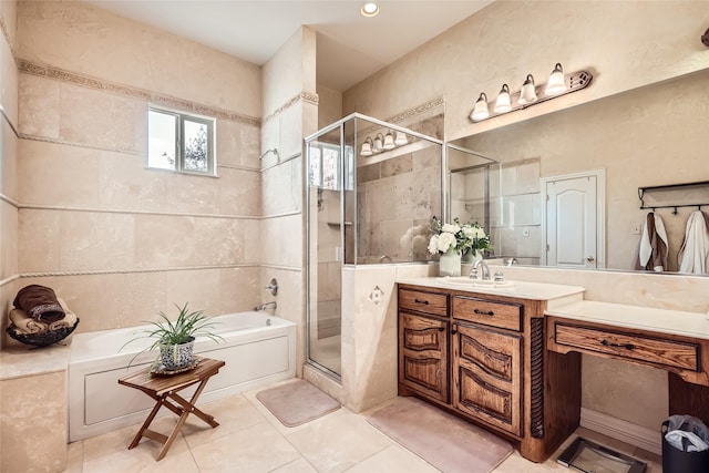 114 Mischief Ln, Rockwall, TX 75032 - bathroom featuring a bath, a stall shower, vanity, and tile patterned flooring