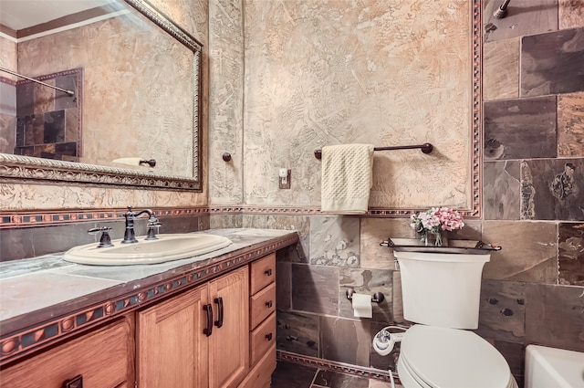 114 Mischief Ln, Rockwall, TX 75032 - bathroom featuring tile walls, vanity, and bathing tub / shower combination