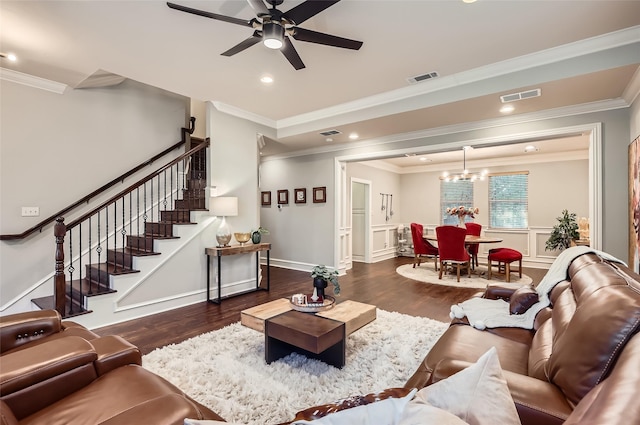 114 Mischief Ln, Rockwall, TX 75032 - living room featuring wood finished floors, a ceiling fan, ornamental molding, stairway, and a chandelier