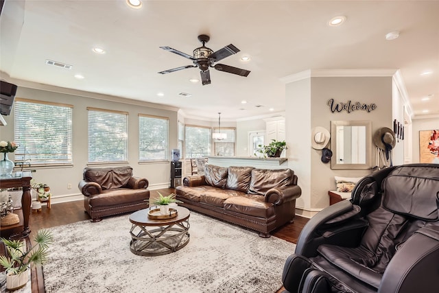 114 Mischief Ln, Rockwall, TX 75032 - living area featuring crown molding, wood finished floors, ceiling fan, healthy amount of natural light, and recessed lighting