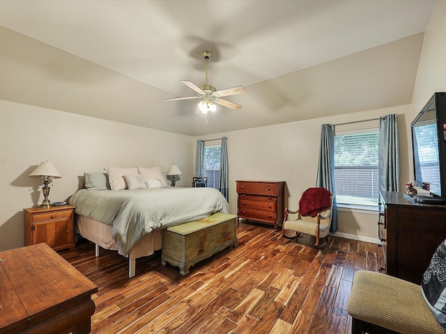 1597 Sweetbriar Dr, Allen, TX 75002 - bedroom with dark wood finished floors, vaulted ceiling, and a ceiling fan
