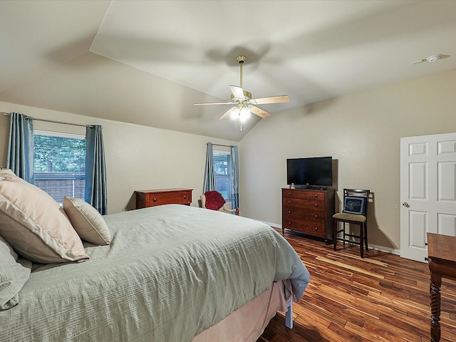 1597 Sweetbriar Dr, Allen, TX 75002 - bedroom featuring lofted ceiling, dark wood-style flooring, and a ceiling fan