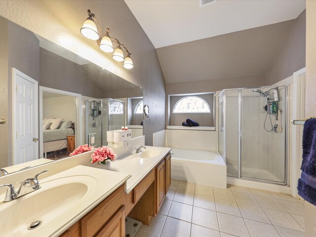 1597 Sweetbriar Dr, Allen, TX 75002 - ensuite bathroom with lofted ceiling, tile patterned floors, a bath, a shower stall, and double vanity