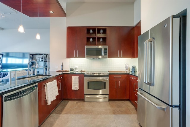 2600 W 7th St Unit 2452, Fort Worth, TX 76107 - kitchen featuring stainless steel appliances, backsplash, pendant lighting, open shelves, and light tile patterned flooring