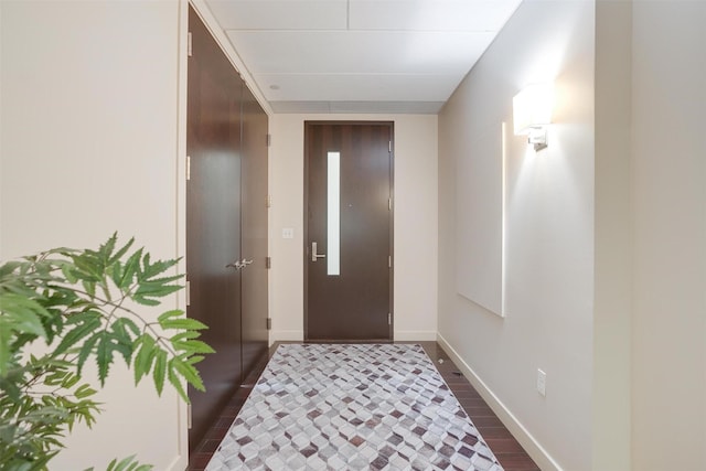 2600 W 7th St Unit 2452, Fort Worth, TX 76107 - entrance foyer with baseboards and dark wood-type flooring