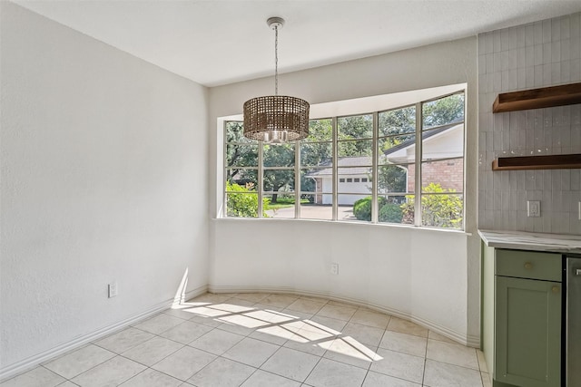 212 Timberlake Dr, Azle, TX 76020 - unfurnished dining area with a chandelier and light tile patterned floors