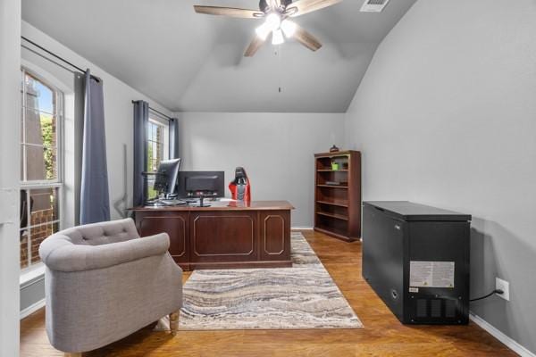 2732 Cowboy Trl, Little Elm, TX 75068 - office space featuring lofted ceiling, a ceiling fan, and wood finished floors