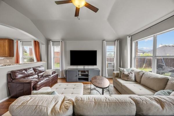 2732 Cowboy Trl, Little Elm, TX 75068 - living room with lofted ceiling, healthy amount of natural light, a ceiling fan, and wood finished floors