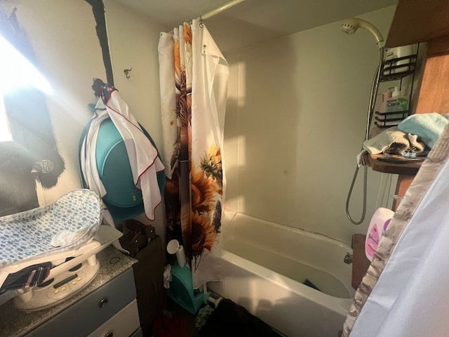 740 Ash St, Blossom, TX 75416 - bathroom with shower / tub combo with curtain