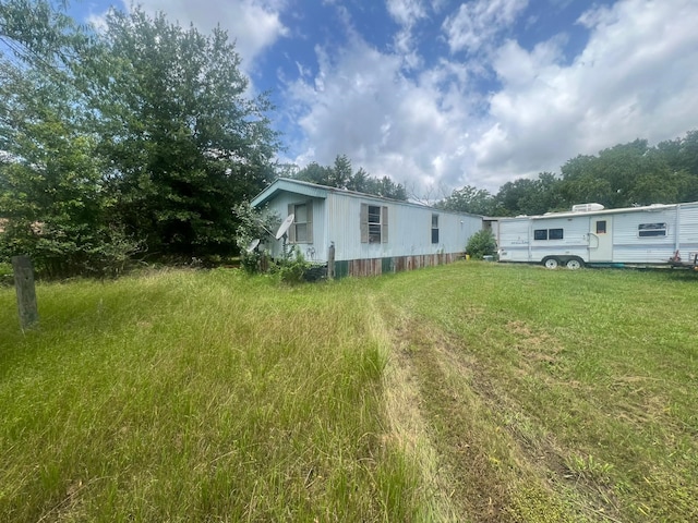 740 Ash St, Blossom, TX 75416 - view of green lawn
