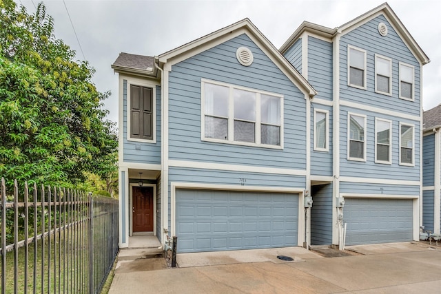 7416 Coronado Ave Unit 14, Dallas, TX 75214 - view of property with driveway and a garage