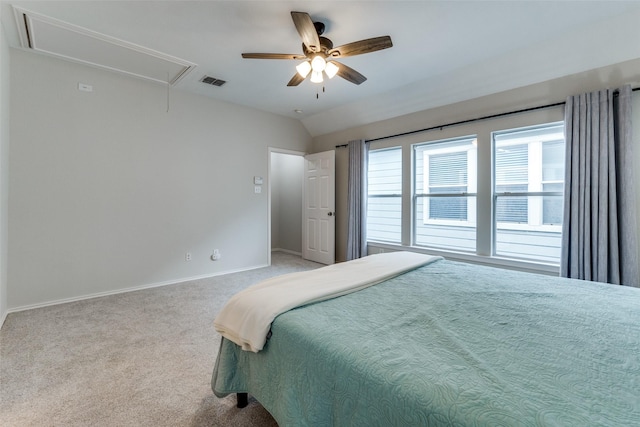 7416 Coronado Ave Unit 14, Dallas, TX 75214 - bedroom featuring attic access, carpet flooring, vaulted ceiling, and a ceiling fan