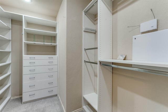7416 Coronado Ave Unit 14, Dallas, TX 75214 - spacious closet featuring light colored carpet
