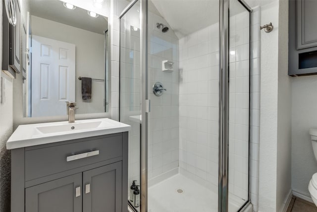 7416 Coronado Ave Unit 14, Dallas, TX 75214 - bathroom featuring a stall shower and vanity