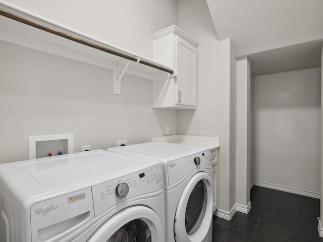 324 Nursery Ln, Fort Worth, TX 76114 - laundry area with washing machine and clothes dryer, cabinet space, and dark tile patterned flooring