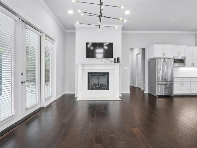 324 Nursery Ln, Fort Worth, TX 76114 - unfurnished living room featuring crown molding, a fireplace with flush hearth, a chandelier, and dark wood-style floors