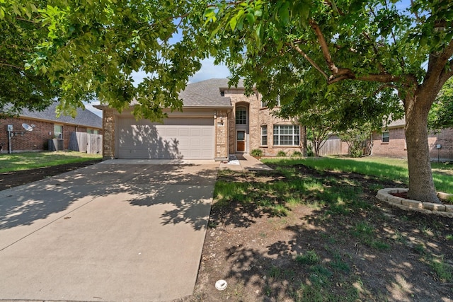 108 Bear Trl, Waxahachie, TX 75165 - view of front of house with brick siding, driveway, and a garage