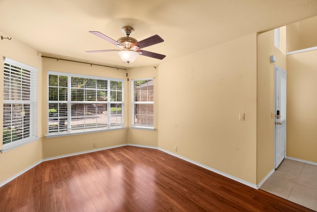 108 Bear Trl, Waxahachie, TX 75165 - empty room with a ceiling fan and wood finished floors
