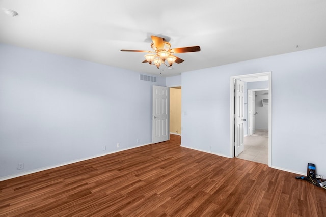 108 Bear Trl, Waxahachie, TX 75165 - unfurnished bedroom with wood finished floors and a ceiling fan
