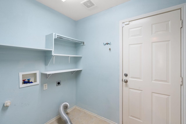 108 Bear Trl, Waxahachie, TX 75165 - laundry room featuring hookup for an electric dryer, hookup for a washing machine, and tile patterned floors