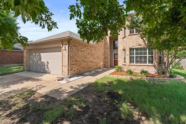 108 Bear Trl, Waxahachie, TX 75165 - view of front facade featuring brick siding, a garage, and driveway