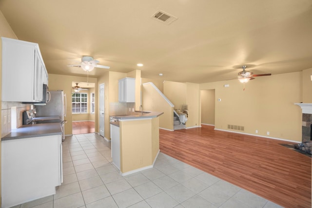 108 Bear Trl, Waxahachie, TX 75165 - kitchen with ceiling fan, open floor plan, light tile patterned floors, and recessed lighting
