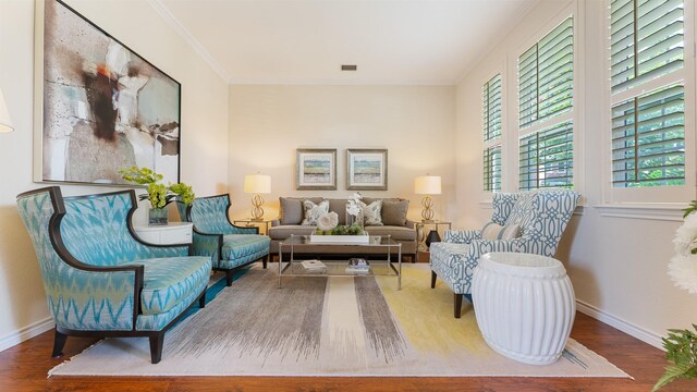 2741 Barrington Dr, Plano, TX 75093 - living area with plenty of natural light, wood finished floors, and crown molding