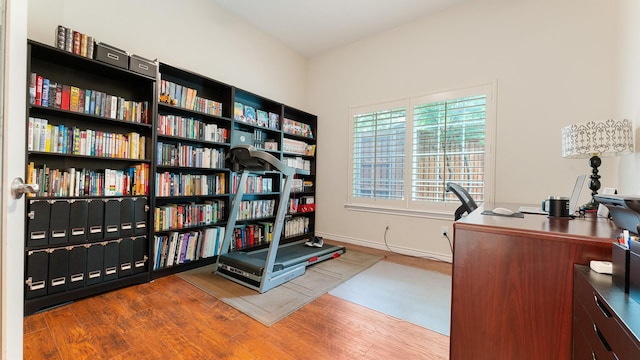 2741 Barrington Dr, Plano, TX 75093 - home office with wood finished floors and baseboards