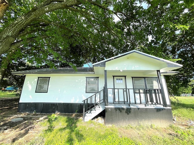 5146 Fm 879, Palmer, TX 75152 - view of front facade with a porch