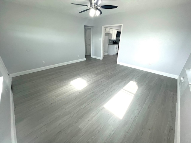 5146 Fm 879, Palmer, TX 75152 - empty room featuring ceiling fan and dark wood-style floors