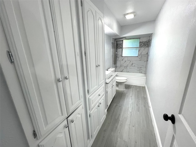 5146 Fm 879, Palmer, TX 75152 - bathroom featuring wood finished floors, vanity, and tub / shower combination