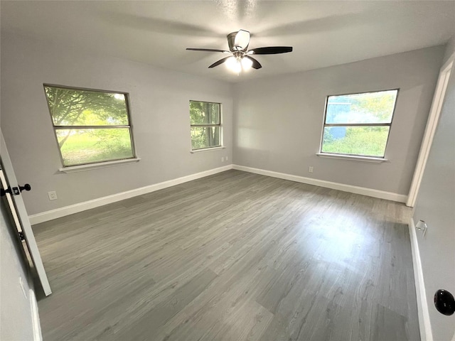 5146 Fm 879, Palmer, TX 75152 - unfurnished room with dark wood finished floors and a ceiling fan