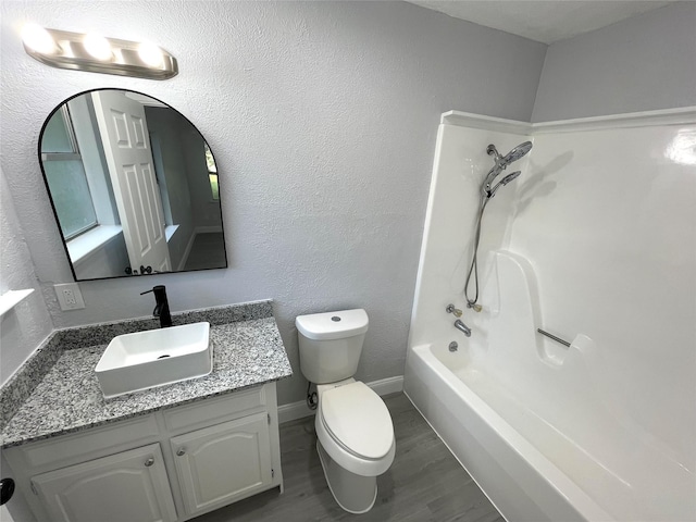 5146 Fm 879, Palmer, TX 75152 - bathroom featuring vanity, wood finished floors, and bathtub / shower combination