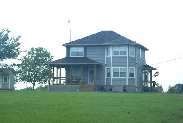 1583 County Road 34520, Sumner, TX 75486 - view of front of property featuring a porch, a front yard, and a shingled roof