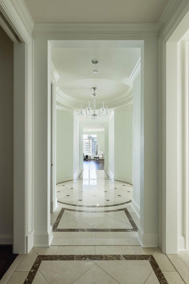 2555 N Pearl St Unit 1101, Dallas, TX 75201 - corridor featuring inlaid floor details, ornamental molding, a chandelier, and a tray ceiling