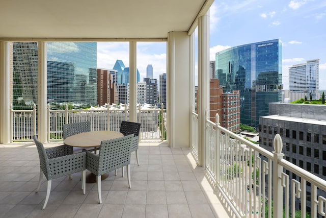 2555 N Pearl St Unit 1101, Dallas, TX 75201 - balcony with a skyline view and outdoor dining area