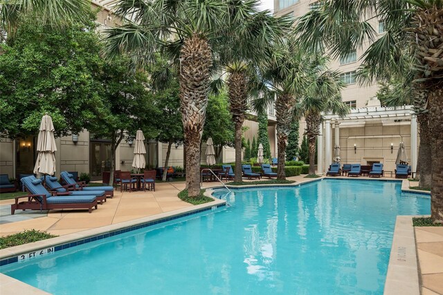 2555 N Pearl St Unit 1101, Dallas, TX 75201 - community pool featuring a patio area and a pergola