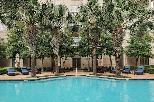2555 N Pearl St Unit 1101, Dallas, TX 75201 - community pool featuring french doors and a patio