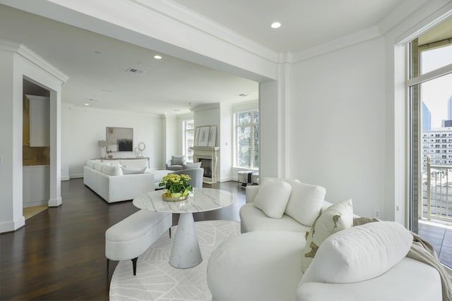 2555 N Pearl St Unit 1101, Dallas, TX 75201 - living area featuring healthy amount of natural light, crown molding, wood finished floors, a fireplace, and recessed lighting