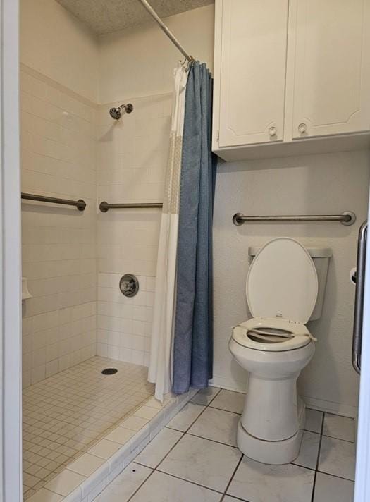 1601 Meadow Ln, Terrace, Fort Worth, TX 76112 - bathroom featuring a shower stall and tile patterned floors
