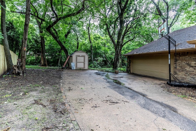 1237 Linkwood Ln, Lancaster, TX 75146 - exterior space with a storage shed and driveway